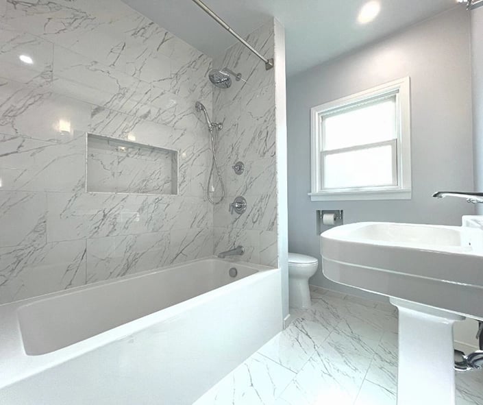 A deep soaker tub was installed as part of the bathroom renovation.