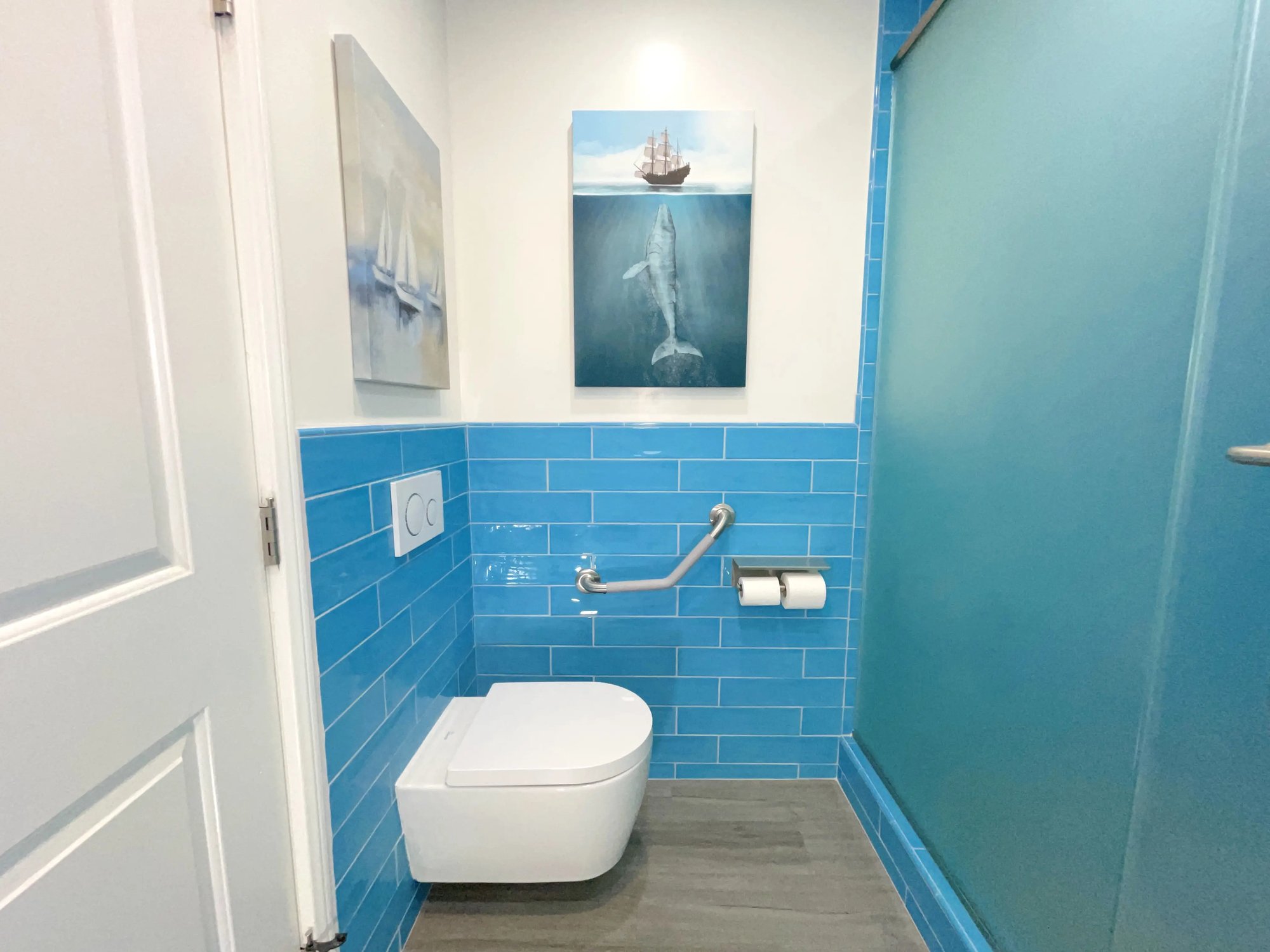 A wall hung toilet by Geberit was installed for the master bathroom.
