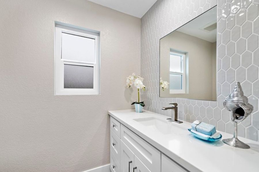 11 - half bath - tile backsplash - quartz counter