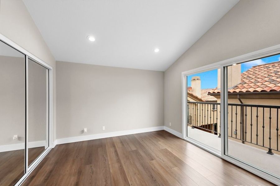 16 - second bedroom with balcony - condo renovation