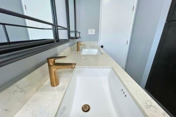 06 - custom his hers vanity - gold faucets 