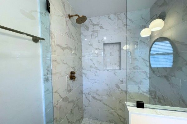 11 - marble look tile shower