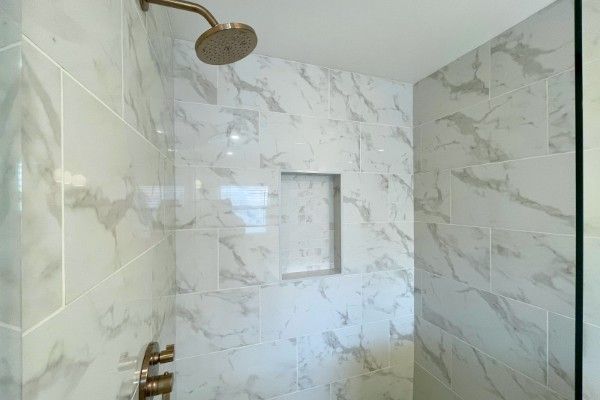 12 - gold brass hansgrohe shower hardware 