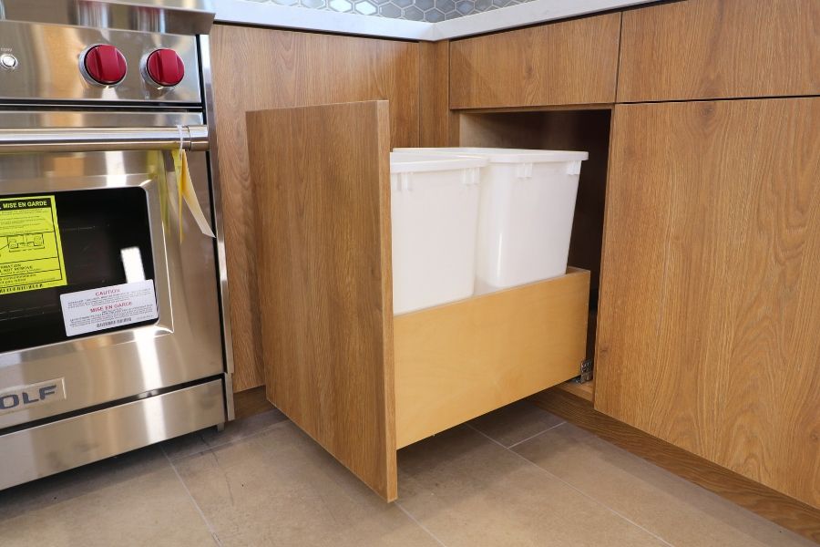 10 - Kitchen Cabinet - rev a shelf - waste bin pull out