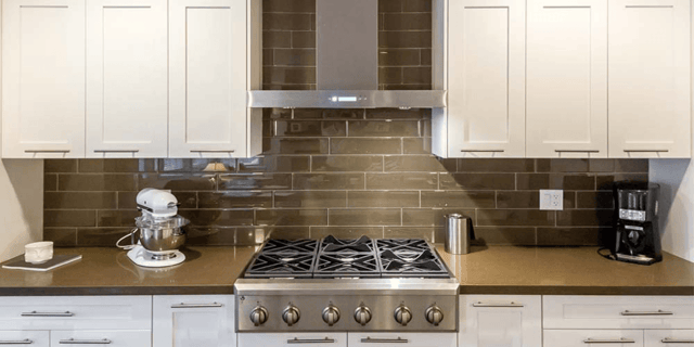 Making a Statement in the Kitchen with a Tiled Vent Hood. - The Collected  House